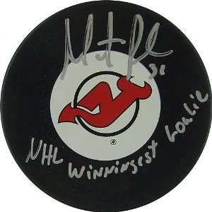  Martin Brodeur Autograph Puck with NHL Winningest Goalie 