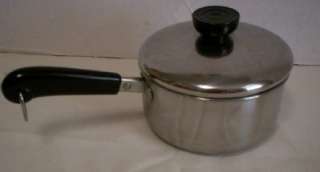   QT SAUCE PAN WITH LID IN VERY GOOD CLEAN USED CONDITION. THE PAN SITS