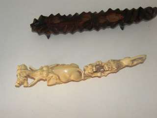 Antique large Chinese ox bone carving of fighting animals, carved from 