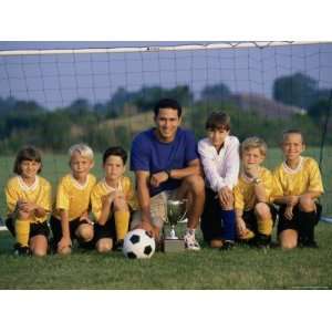  Portrait of a Soccer Team And Coach on a Field with a 