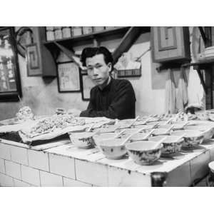  A Man Working in a Sai Ho Street Restaurant Premium 