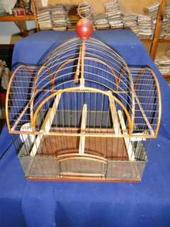 Wonderful antique bird cage. 1880s ca. Metal bars, Wooden frame 