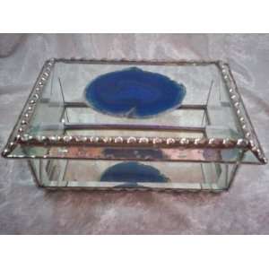   Is Accented with a Highly Polished Thinly Cut Large Blue Agate Stone