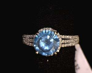 carat Blue Diamond .22 carat side, ring. 2.40g w  