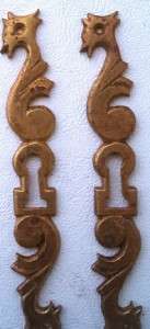 PAIR BRASS GRIFFIN STYLE ESCUTCHEONS / KEYHOLE COVERS  