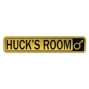   HUCK S ROOM  STREET SIGN NAME