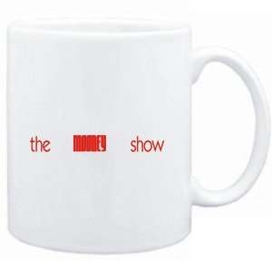 Mug White  The Mooney show  Last Names  Sports 