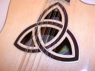 The Trinity Dreadnought features a solid sitka spruce top with an 