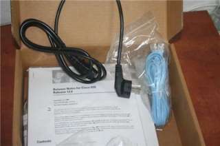 CISCO 1600 ROUTER With power + CABLE AND CD ROM.  