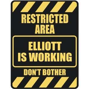   RESTRICTED AREA ELLIOTT IS WORKING  PARKING SIGN