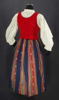   womans folk costume from Ilmajoki ikat skirt blouse brooch vest