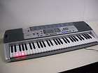 Casio LK 100 Lighted Keyboard with Premium Accessories Package