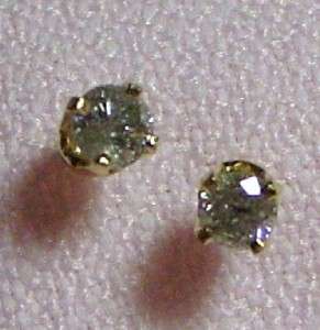 14k yellow gold .25 ct. tw. diamond stud earrings  