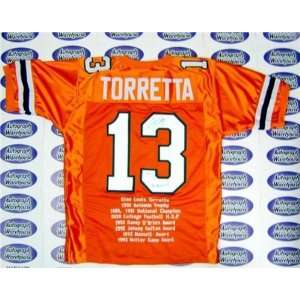  Gino Torretta Autographed/Hand Signed Football Jersey 