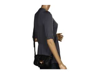   in this stylish leather crossbody bag from MICHAEL Michael Kors