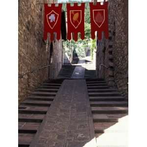  Medieval Flags Above Stone Walkway, Assisi, Umbria, Italy 