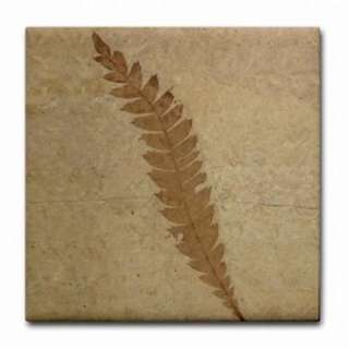 This unique ceramic tile coaster features an image of a fern leaf 