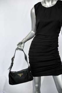 The perfect everyday bag, this Prada leather and nylon handbag fits 