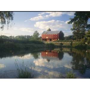 An Old Red Barn Reflected in a Pond National Geographic Collection 